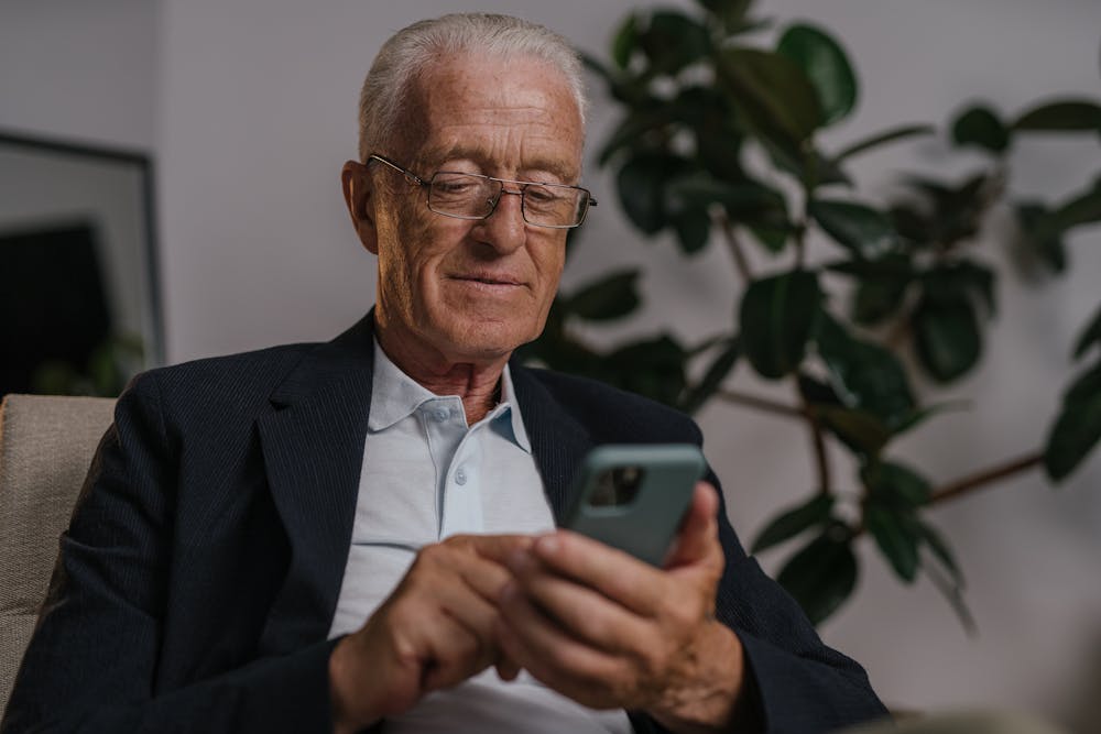 Senior man with his phone