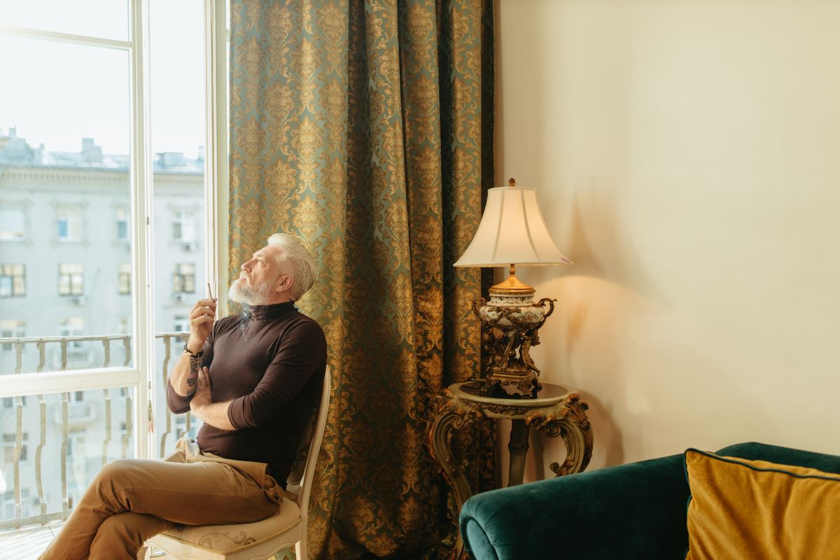 A senior man in quiet thought