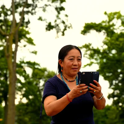 Senior woman on the phone outdoors